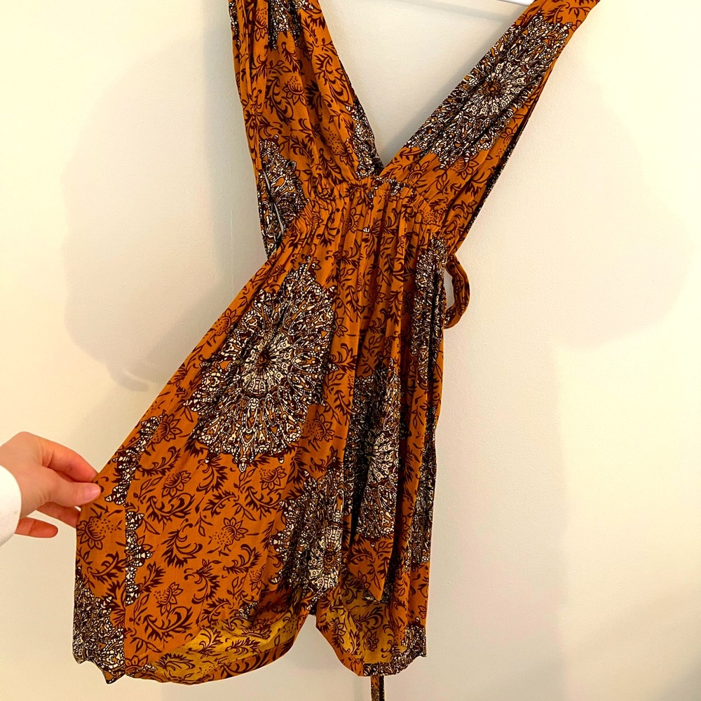 Burnt orange short romper. Handmade and purchased in Vietnam.